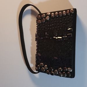 BIJOUX TERNER bead embellished black hand bag.